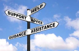 signs that read help, support, advice, guidance, and assistance